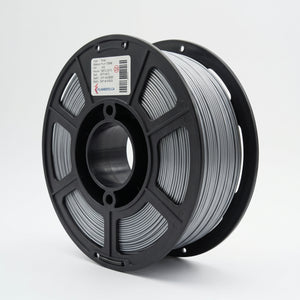 Standard PLA Silk Silver 1.75mm filament on a plastic spool
